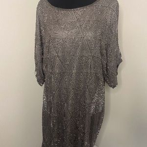 Very dressy beautiful beaded dress Gray. No tag… fits size 10